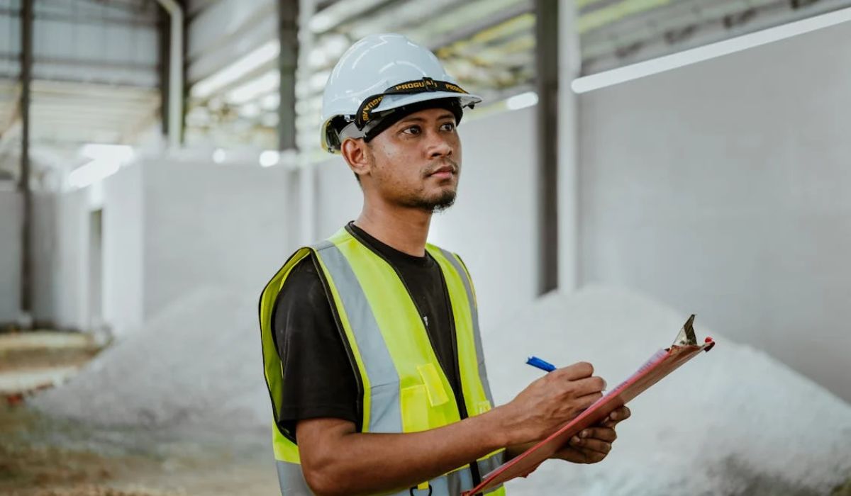 A contractor supervising a site