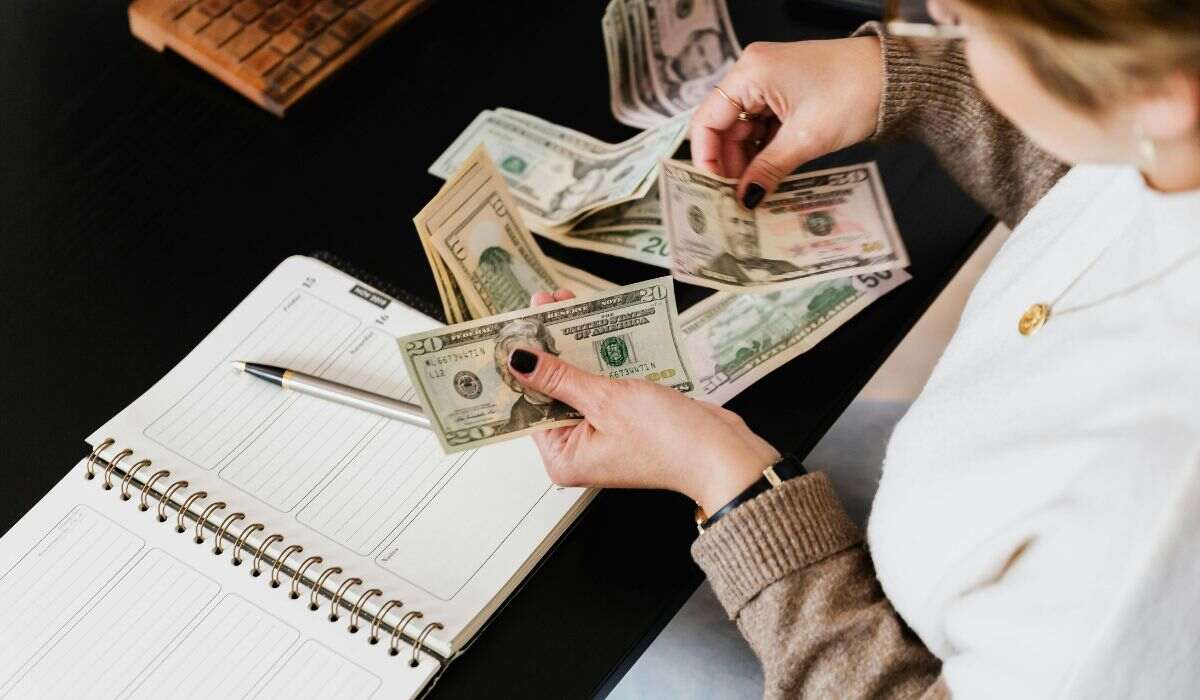 A woman counting her passive income