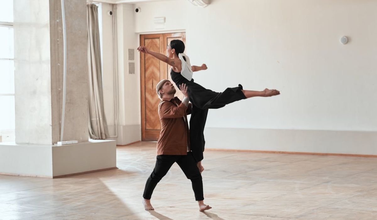 freelancer choreographer teaching dance to its student