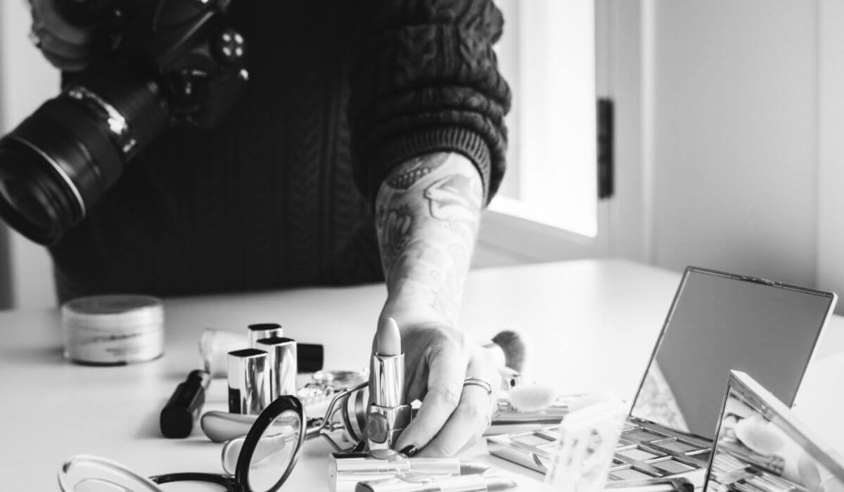 women clicking photos of cosmetics