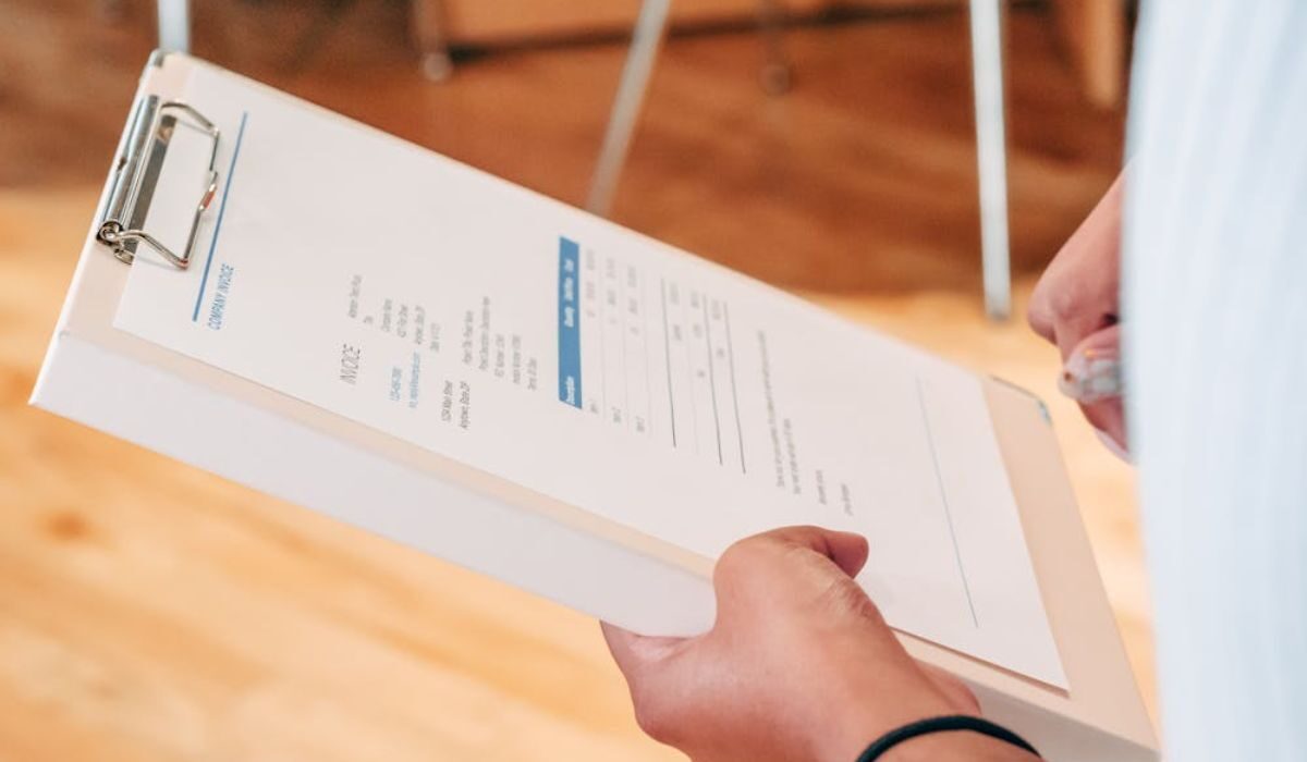 A person having a glance through a Bill of Lading