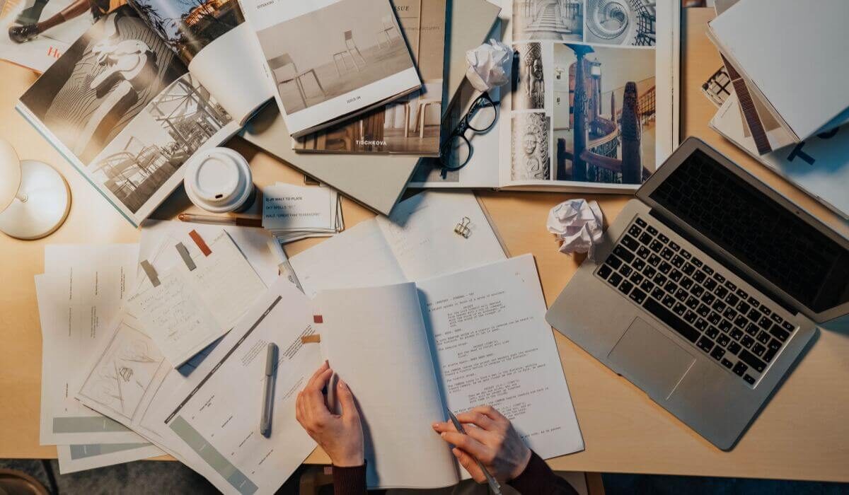 A freelance editor, reviewing and correcting a block of text.