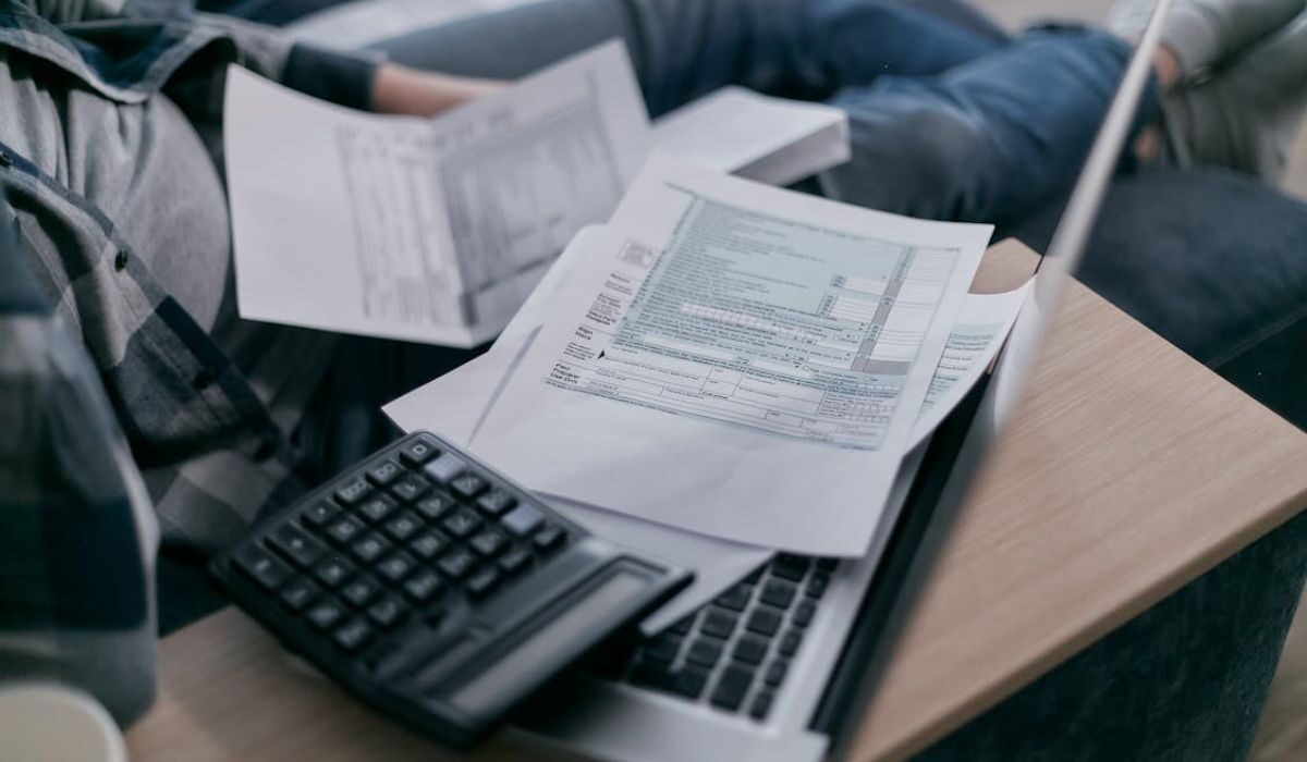 An Itemized Bill lying on the laptop