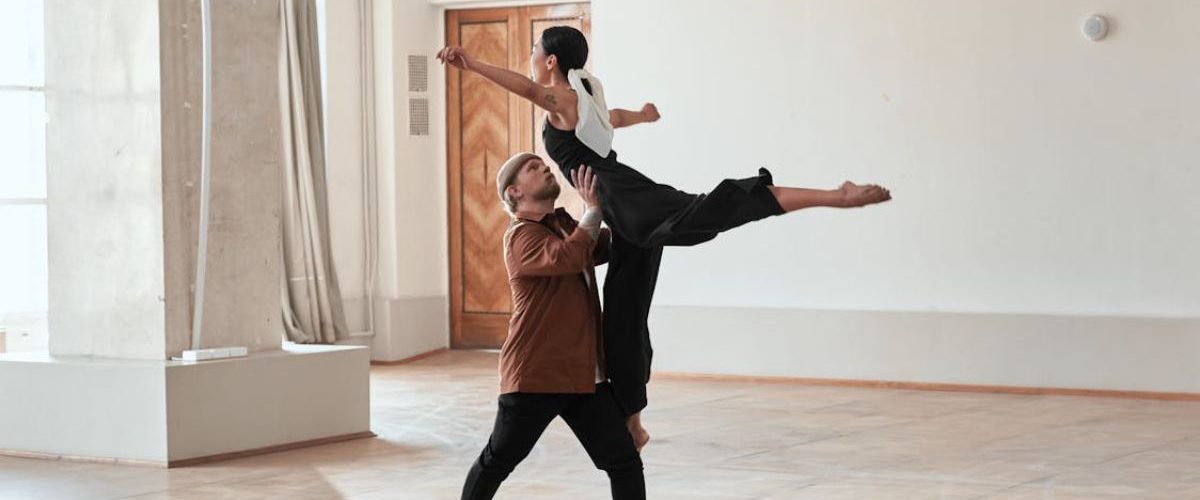 freelancer choreographer teaching dance to its student